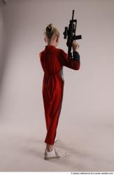 DENISA WITH TWO GUNS